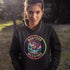 Stay connected to the wild with our Manitoba – Wild & Free hoodie, featuring a majestic deer standing under the vibrant northern lights.